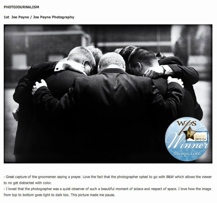 A black and white photo captures five men in formal attire standing in a close circle, heads bowed in a gesture of prayer or reflection. The image is described as evoking a sense of solemnity and space. A Winner badge is in the corner.
