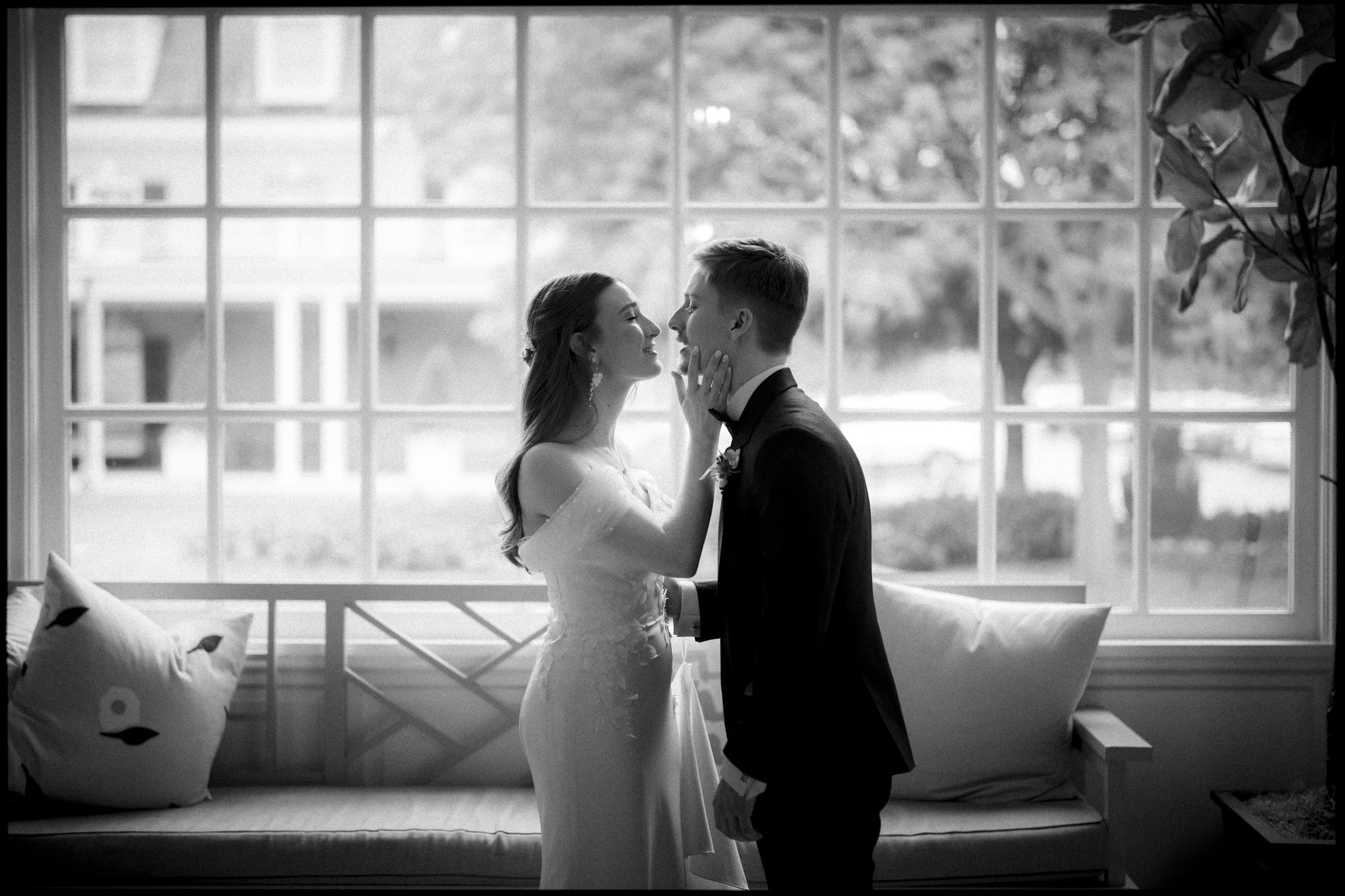 Black and white candid first look portrait at the Carolina Inn by Chapel Hill wedding photographer Joe Payne.