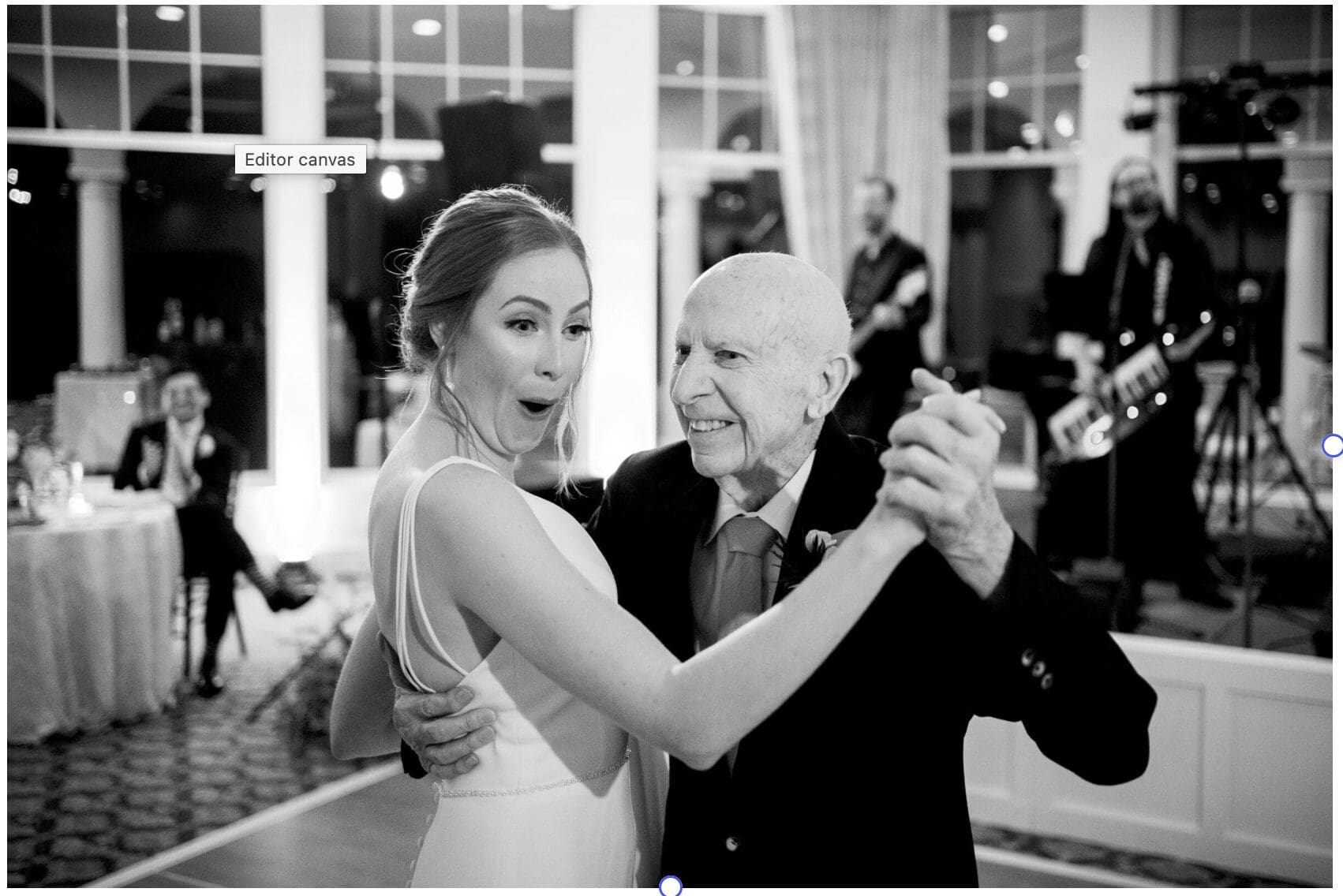 Candid black and white documentary wedding photography of a bride dancing with her grandfather by Joe Payne.